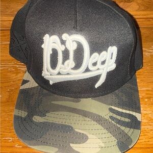 10.Deep Black and Camouflage Snapback Hat